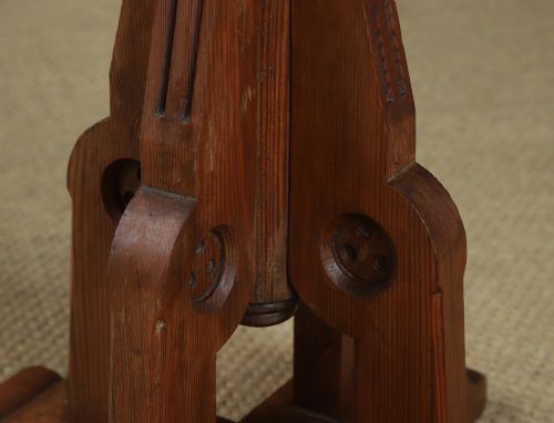 fig 5. An antique Victorian pitch pine lectern featuring a slanted book rest, turned central column, and a Gothic-style pedestal base.