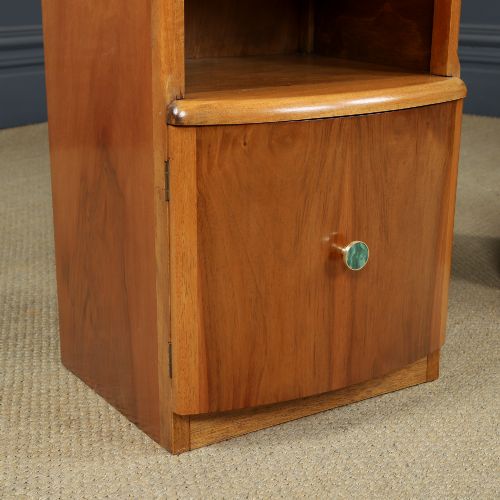 fig 1. A pair of Art Deco walnut bedside tables with an upper open compartment and a lower cupboard featuring a round green handle.