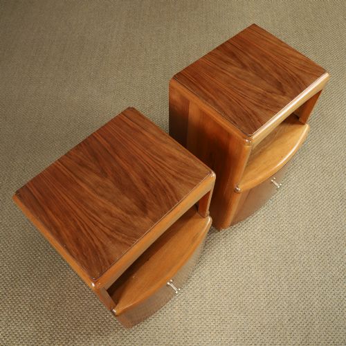 fig 5. A pair of Art Deco walnut bedside tables with an upper open compartment and a lower cupboard featuring a round green handle.