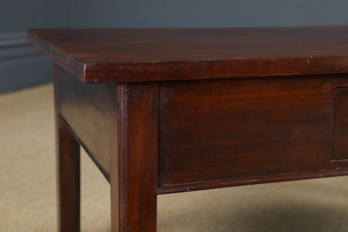 fig 1. An antique rectangular dark mahogany low coffee table featuring a single drawer with two turned handles and a brass keyhole.