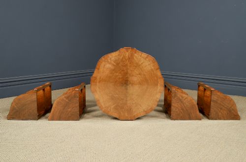 fig 10. An Art Deco round walnut nest of five occasional tables featuring four quadrant side tables fitted beneath a central coffee table top.