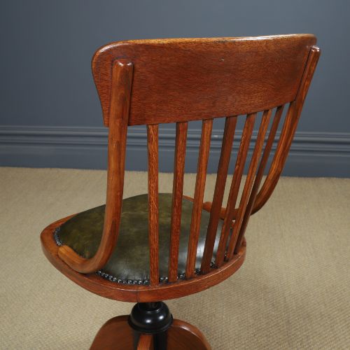 fig 9. A George V period golden oak revolving desk chair featuring a curved spindle backrest, quadruped base, and a padded green leather seat secured with brass studs.