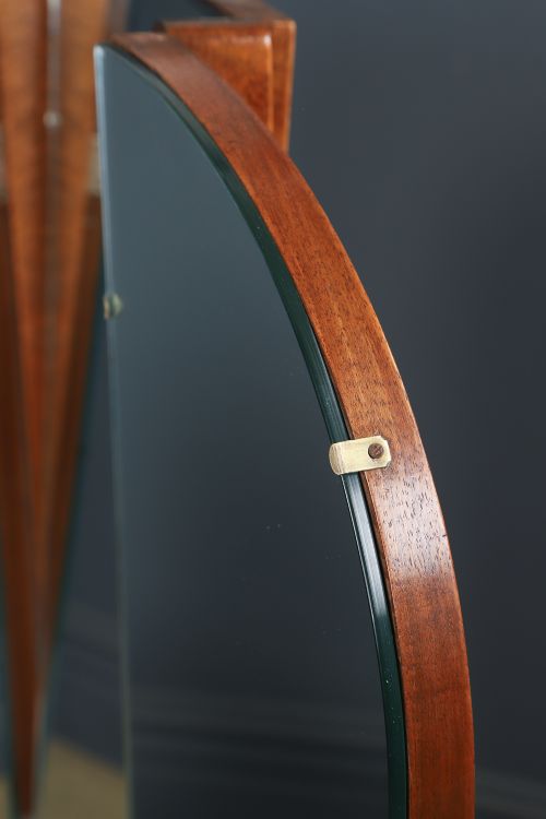 An Art Deco figured walnut dressing table featuring twin pedestal drawers, a central curved drawer, red handles, and a three-panel upright mirror. View XIV