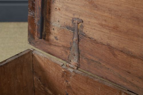 fig 10. A rectangular dark brown oak six-plank coffer featuring V-cut side legs and iron keyhole escutcheon detail.