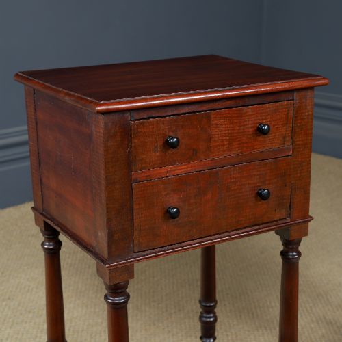 fig 1. A pair of tall Victorian mahogany bedside tables featuring two small drawers with black knobs, turned legs, and a concave lower shelf.