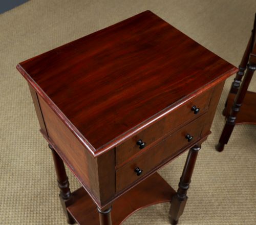 fig 5. A pair of tall Victorian mahogany bedside tables featuring two small drawers with black knobs, turned legs, and a concave lower shelf.