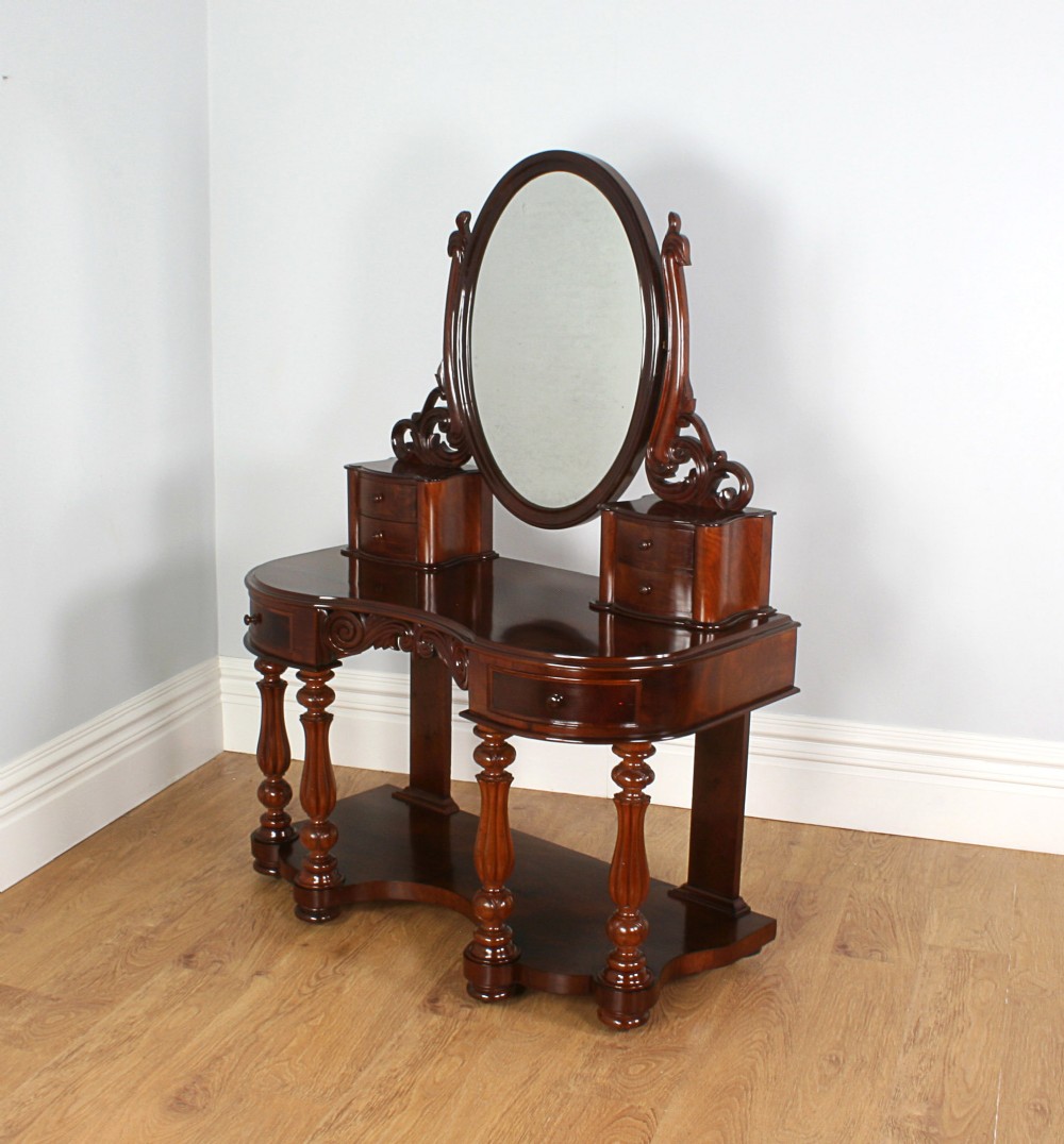 Flame Mahogany Serpentine Victorian Duchess Dressing Table (Circa 1860)