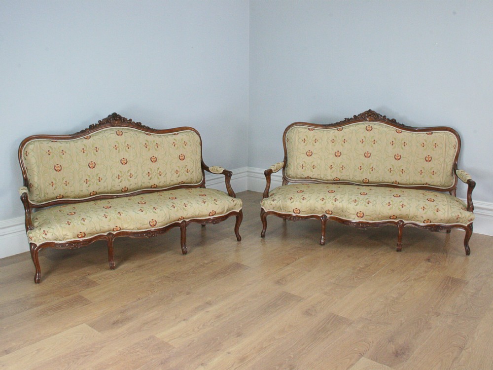 Pair of Antique French Louis XVI Revival Walnut Couches (Circa 1880)