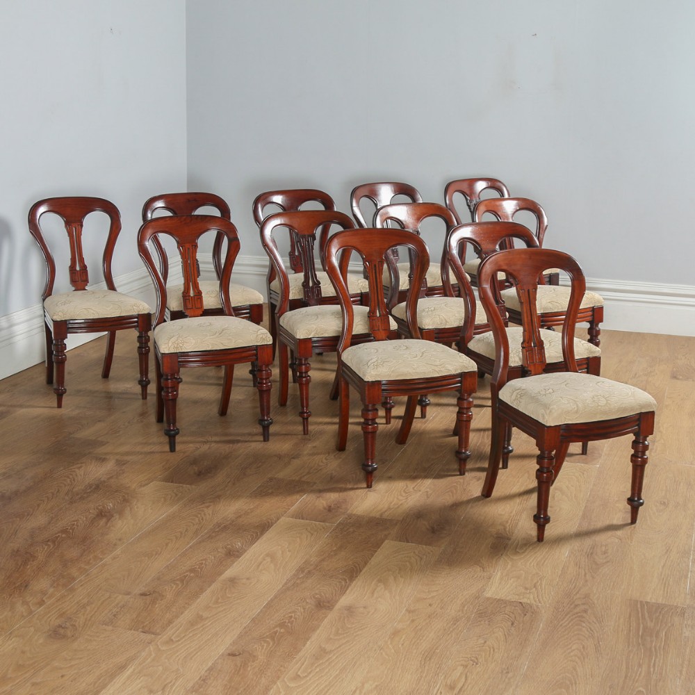Victorian Set of 12 Twelve Mahogany Balloon Back Upholstered Dining Chairs (Circa 1880)