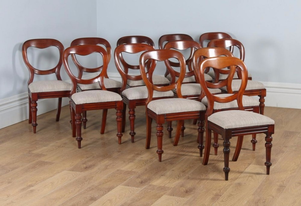 Antique English Victorian Set of Twelve Mahogany Balloon Back Upholstered Dining Chairs (Circa 1860)