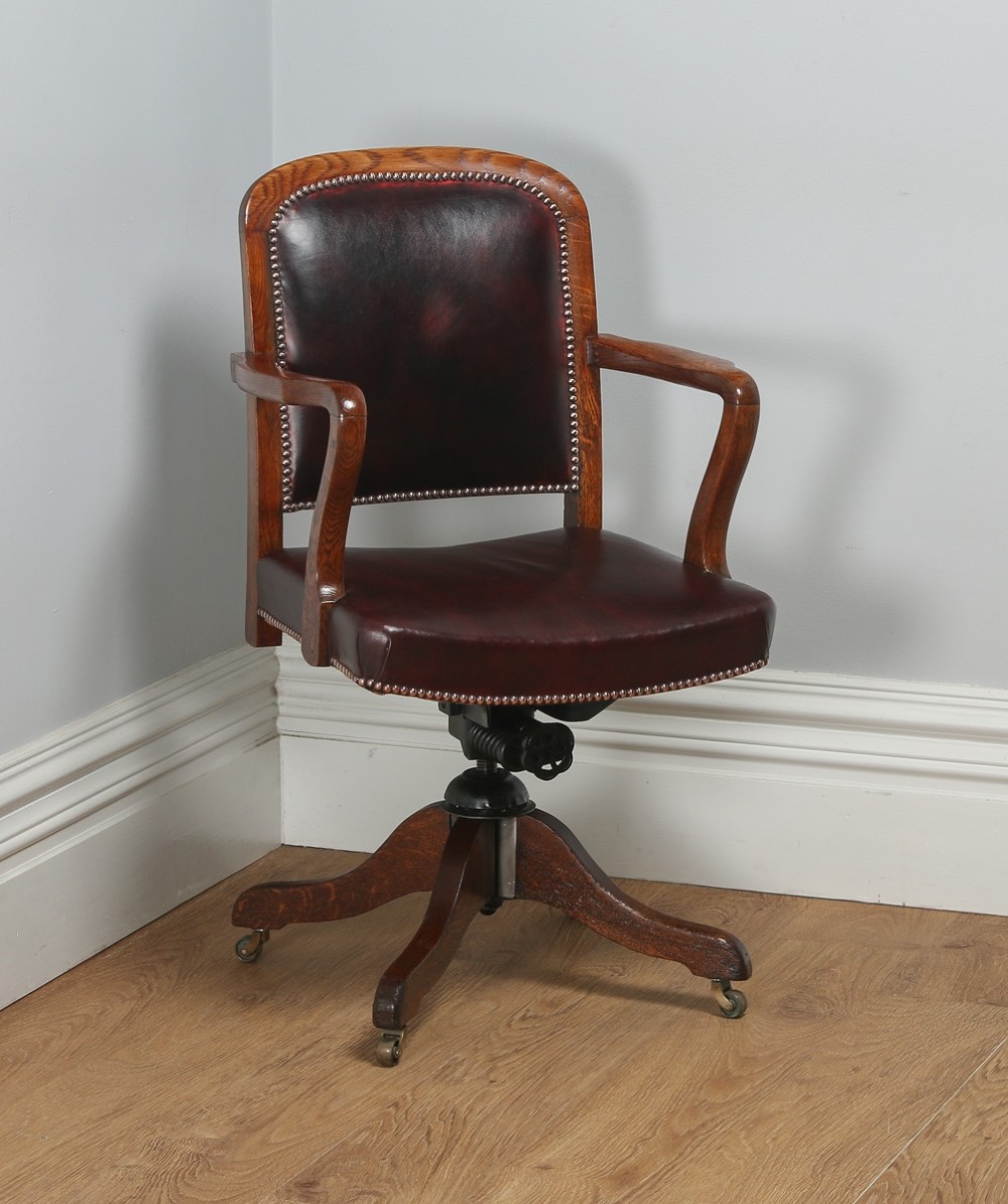 Antique English Edwardian Oak and Red Leather Revolving Office Desk Armchair (Circa 1920)