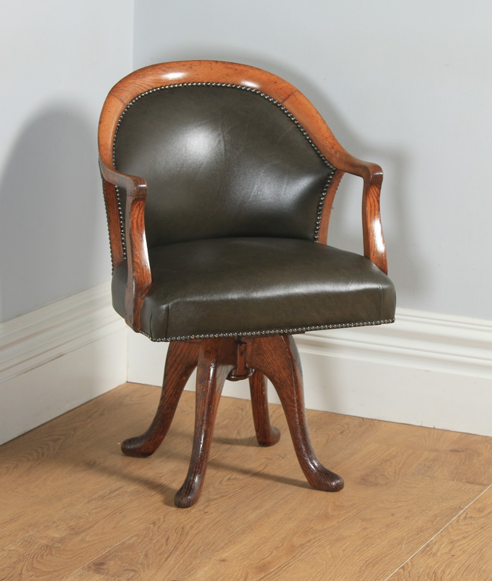 Antique English Victorian Oak & Green Leather Revolving Office Desk Arm Chair by Hampton & Sons of London (Circa 1880)