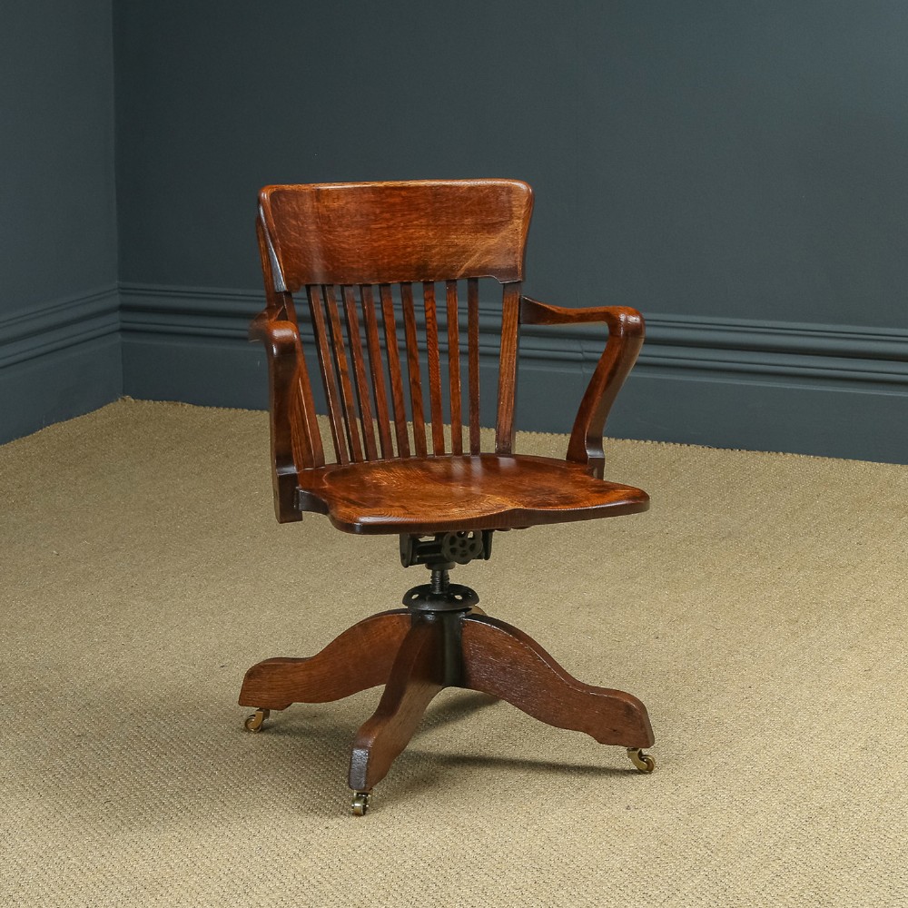 Antique English Edwardian Solid Oak Swivel Revolving Office Desk Arm Chair (Circa 1910)