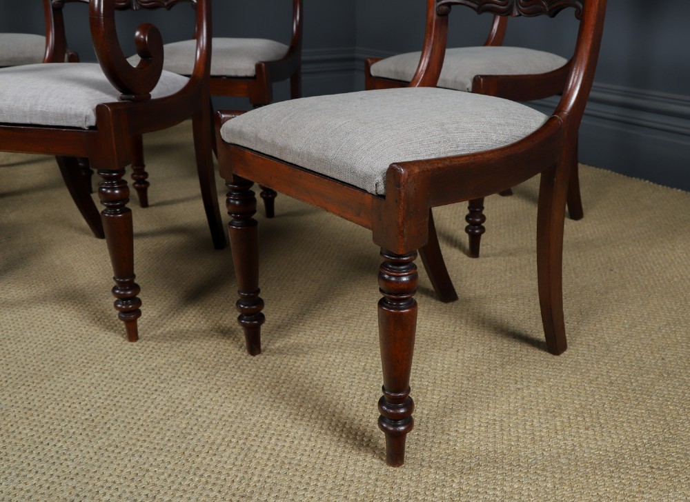 A set of six mahogany Regency dining chairs featuring carved back rails, turned front legs, and light-coloured upholstered seats. View VIII