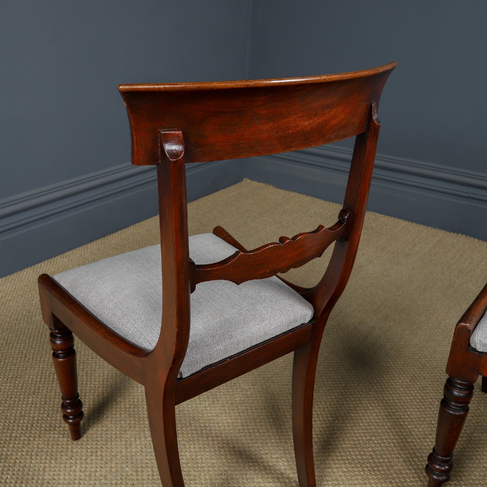 A set of six mahogany Regency dining chairs featuring carved back rails, turned front legs, and light-coloured upholstered seats. View IX