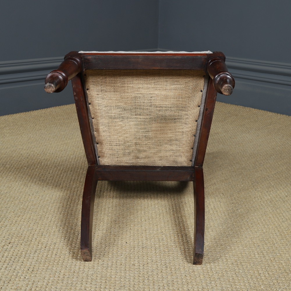 A set of six mahogany Regency dining chairs featuring carved back rails, turned front legs, and light-coloured upholstered seats. View XV