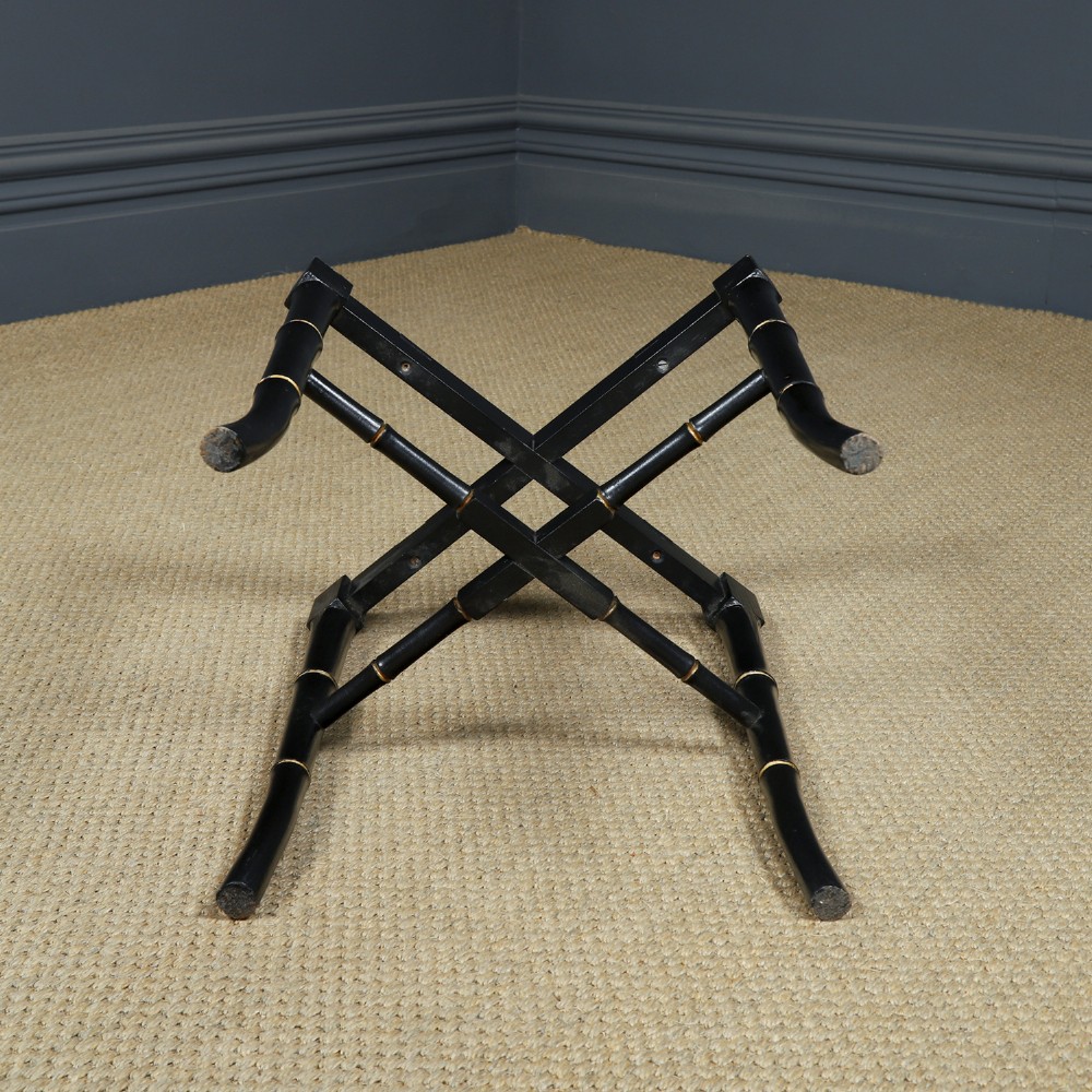 An ebonised Victorian papier-mache tray table featuring gilt Chinoiserie decoration and a lion motif, resting on a faux-bamboo base. View XIII