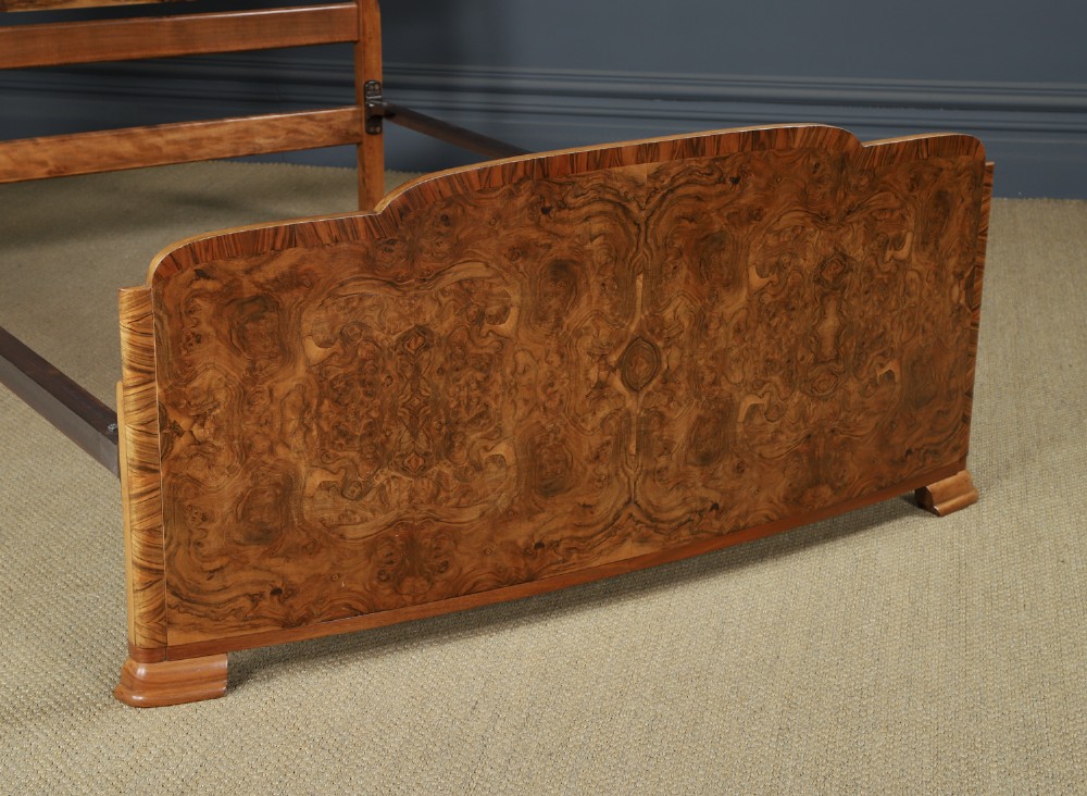 An Art Deco double bed frame featuring a curved cloud-shaped headboard and footboard crafted from figured burr walnut veneer. View II