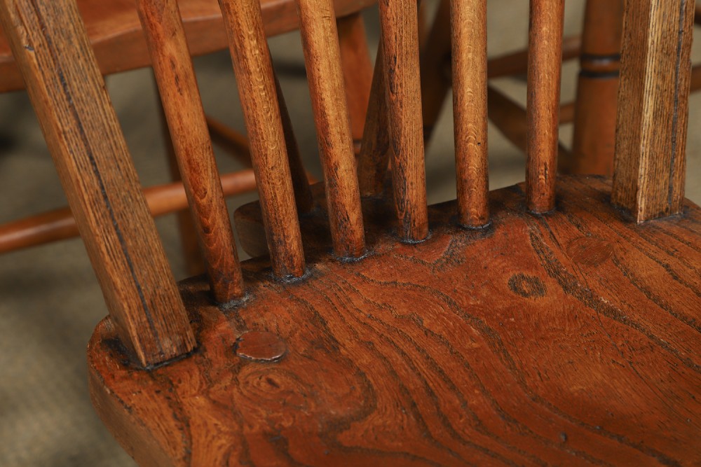 A set of six Edwardian Windsor dining chairs crafted from ash and elm wood, featuring hoop-and-stick backs, shaped seats, turned legs, and H-stretchers. View V