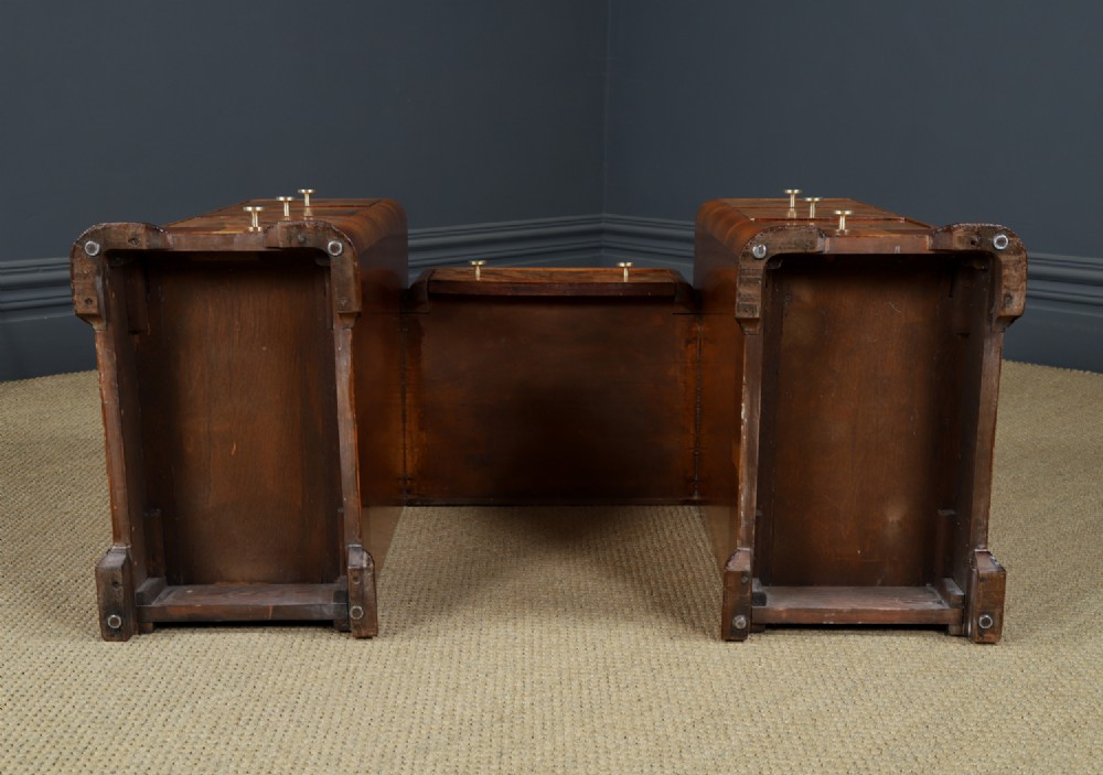 An Art Deco burr walnut pedestal writing desk with green circular knobs and a fitted glass top. View XIV