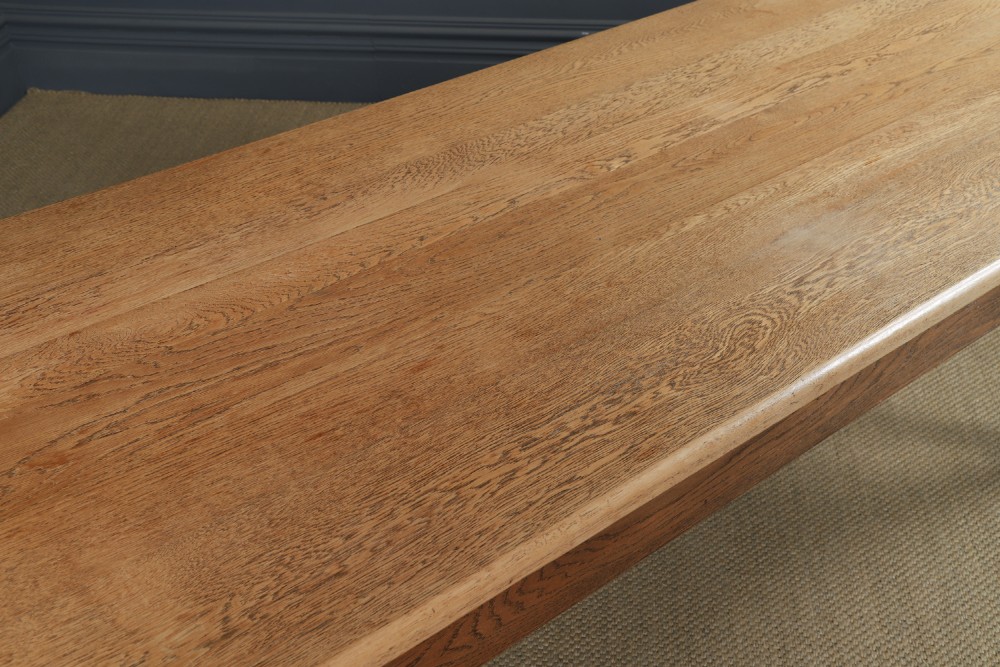 A long Victorian 19th-century refectory dining table with a light pitch pine top and dark oak frame on turned legs. View VI