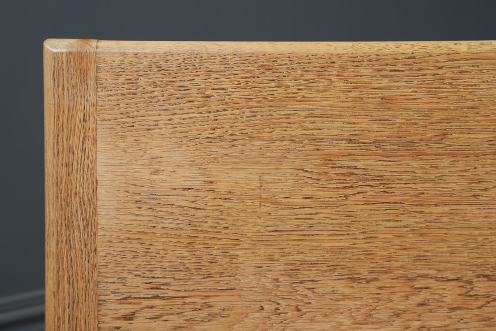 A long Victorian 19th-century refectory dining table with a light pitch pine top and dark oak frame on turned legs. View VIII