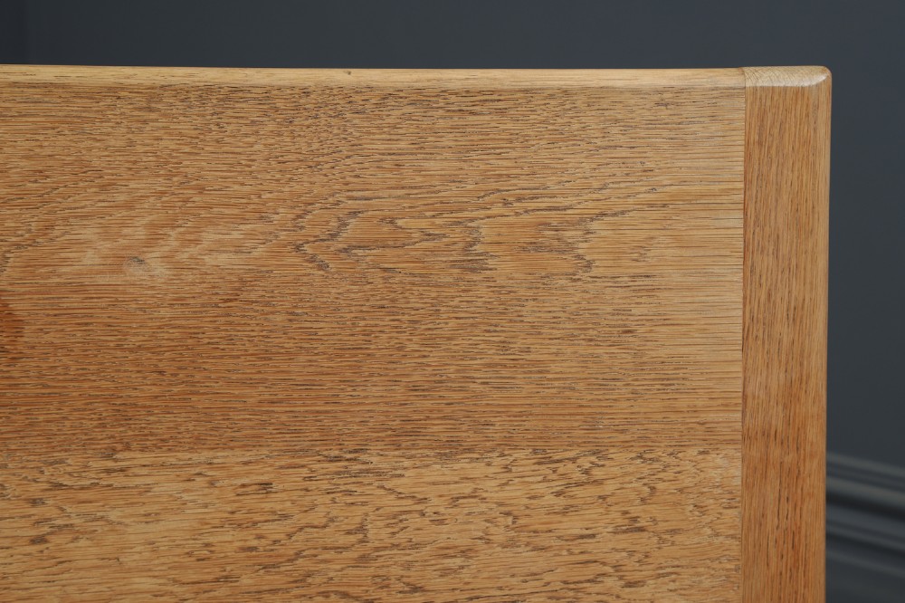 A long Victorian 19th-century refectory dining table with a light pitch pine top and dark oak frame on turned legs. View IX