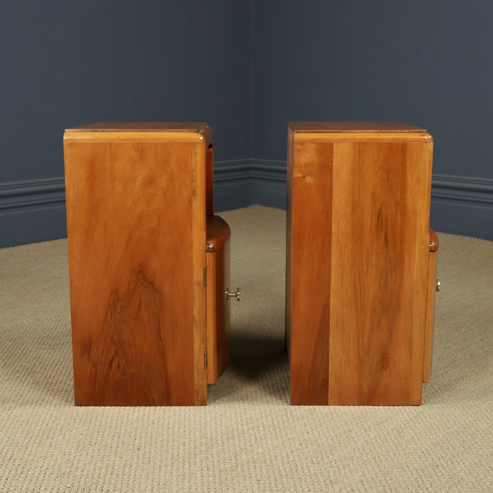 A pair of Art Deco walnut bedside tables with an upper open compartment and a lower cupboard featuring a round green handle. View XI