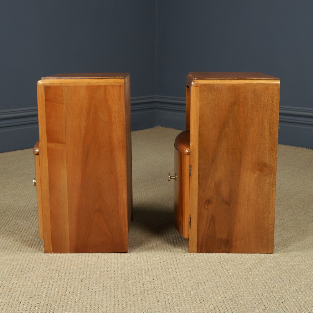 A pair of Art Deco walnut bedside tables with an upper open compartment and a lower cupboard featuring a round green handle. View XII