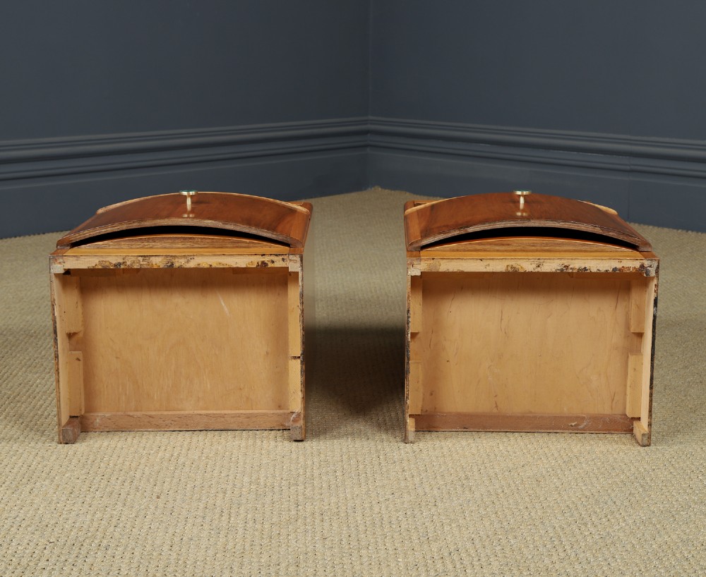 A pair of Art Deco walnut bedside tables with an upper open compartment and a lower cupboard featuring a round green handle. View XV