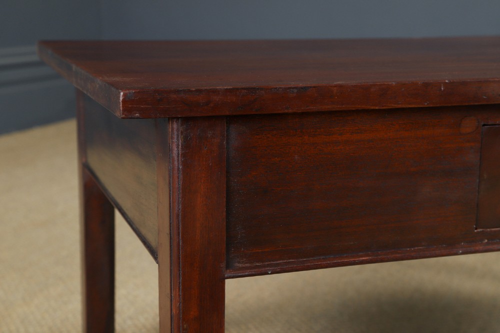 An antique rectangular dark mahogany low coffee table featuring a single drawer with two turned handles and a brass keyhole. View II
