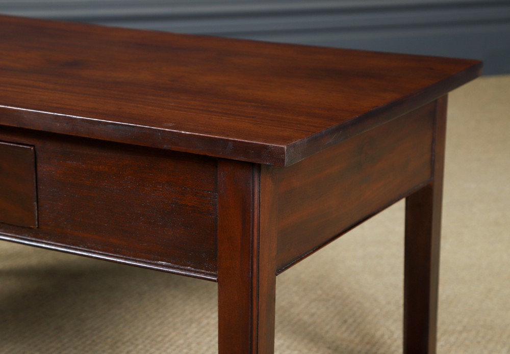 An antique rectangular dark mahogany low coffee table featuring a single drawer with two turned handles and a brass keyhole. View IX