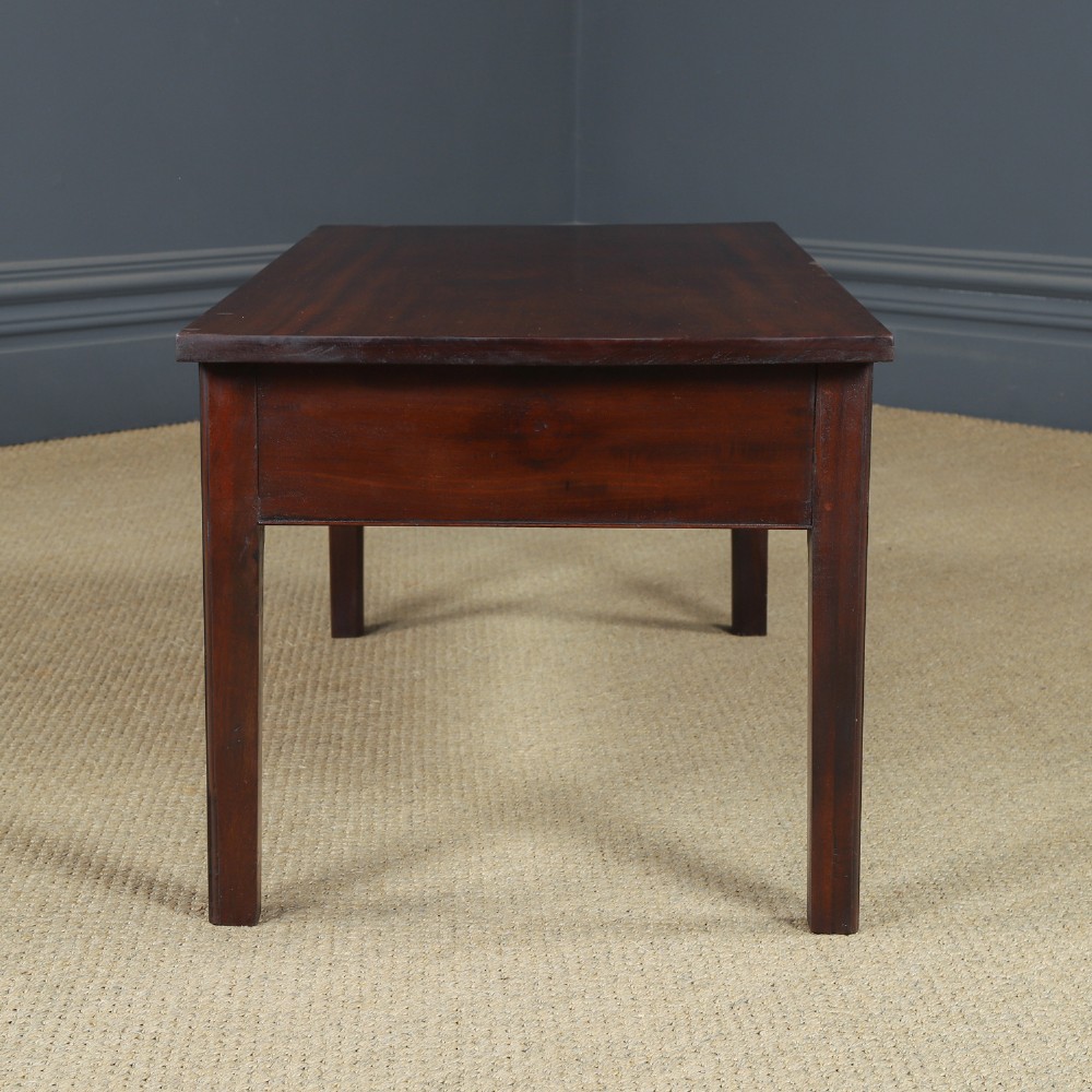 An antique rectangular dark mahogany low coffee table featuring a single drawer with two turned handles and a brass keyhole. View XI