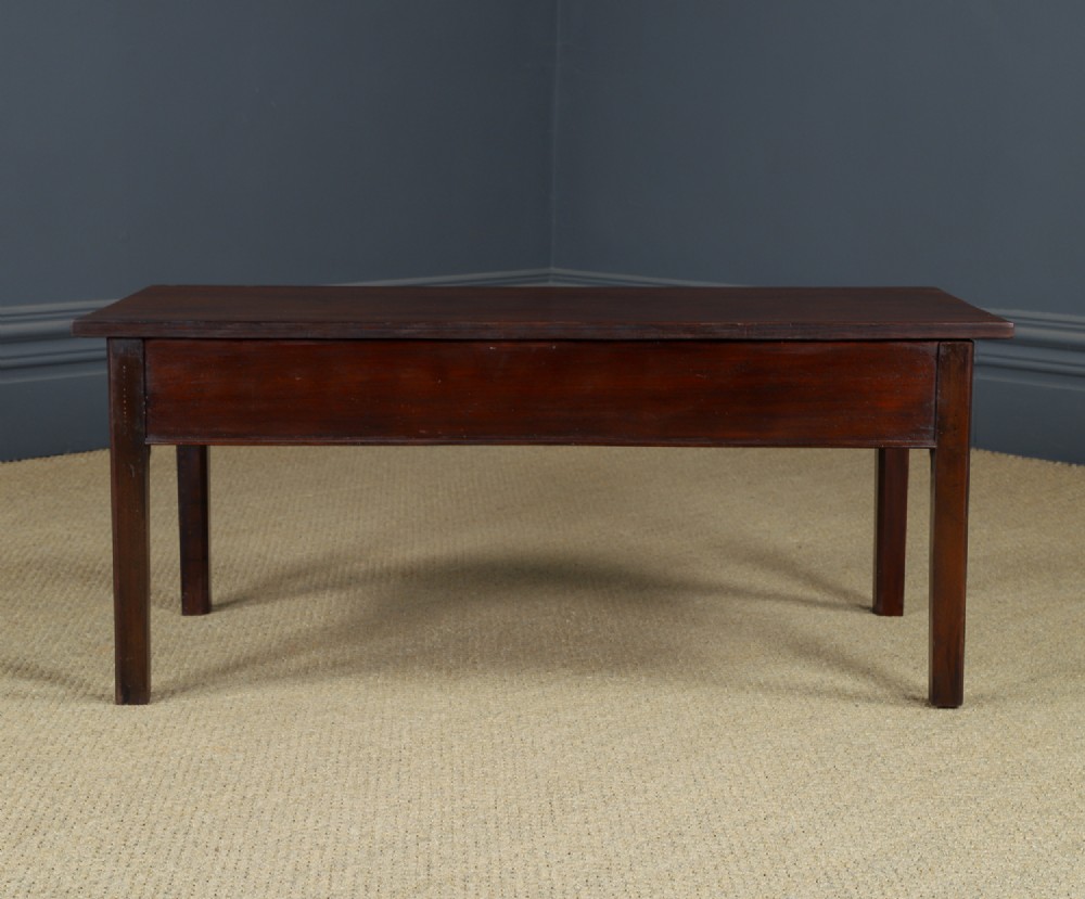 An antique rectangular dark mahogany low coffee table featuring a single drawer with two turned handles and a brass keyhole. View XII