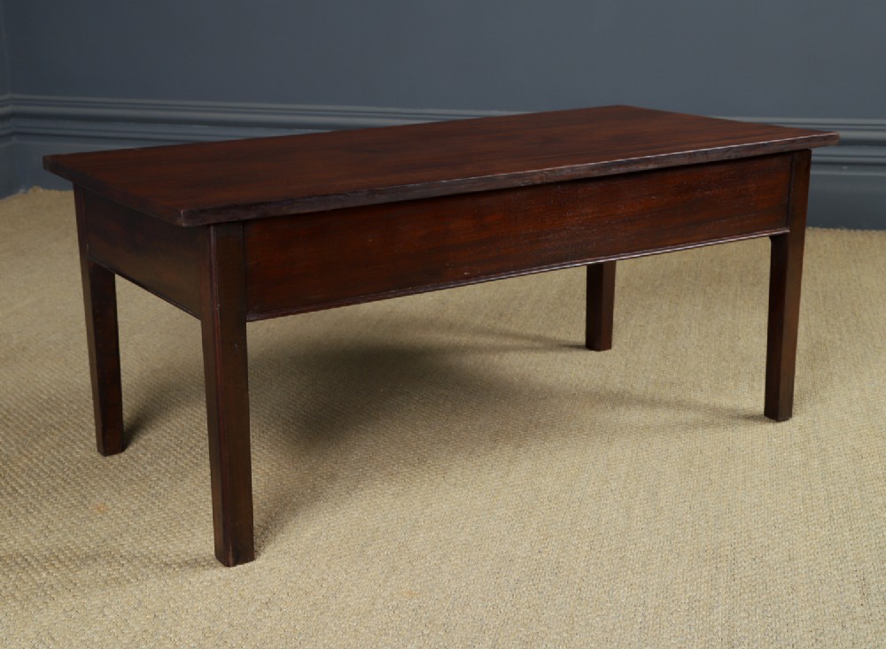An antique rectangular dark mahogany low coffee table featuring a single drawer with two turned handles and a brass keyhole. View XIII