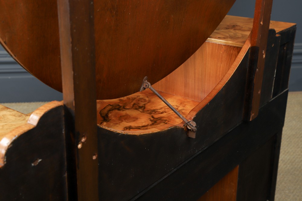 An Art Deco burr walnut pedestal dressing table featuring a large circular central mirror, a kneehole drawer, and three stacked drawers on each pedestal with vertical handles. View XIII