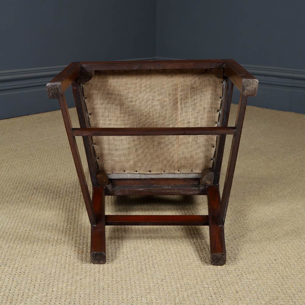 A Georgian mahogany side chair with a pierced carved back splat, square legs connected by stretchers, and a neutral textured seat upholstery. View XIII