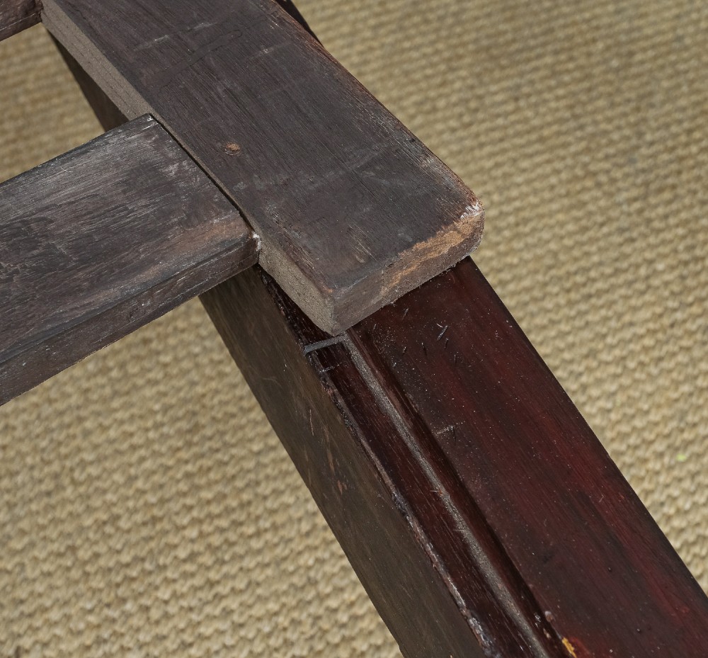 An antique dark timber king-size four-poster bed featuring spiral turned posts, a carved footboard with circular cut-out details, and an upper canopy frame. View XIV