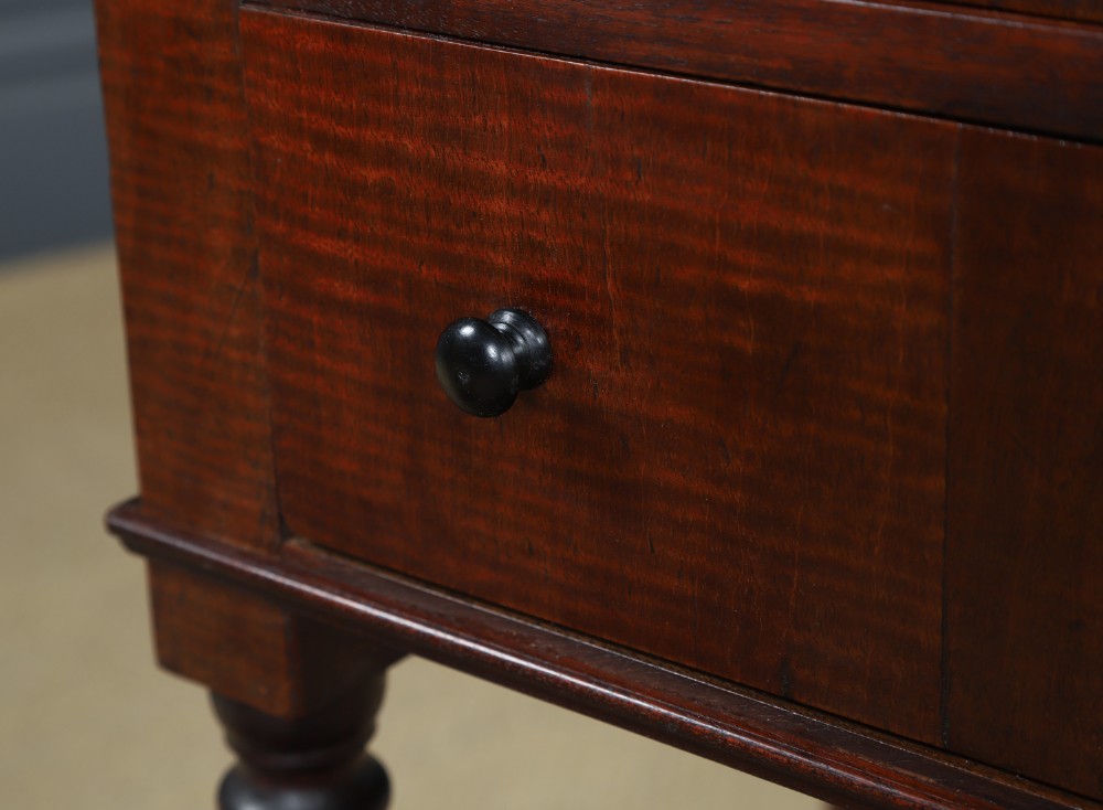 A pair of tall Victorian mahogany bedside tables featuring two small drawers with black knobs, turned legs, and a concave lower shelf. View XII