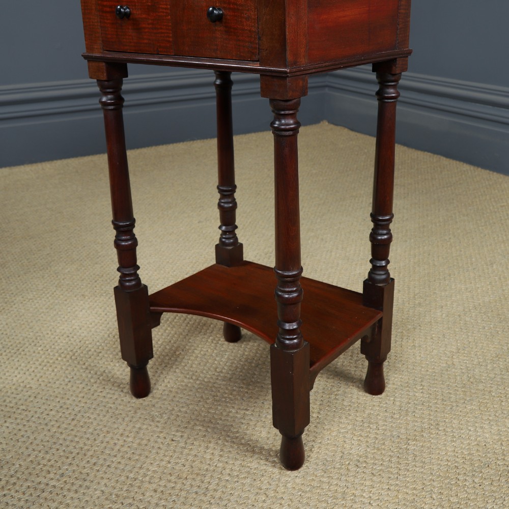 A pair of tall Victorian mahogany bedside tables featuring two small drawers with black knobs, turned legs, and a concave lower shelf. View XIII
