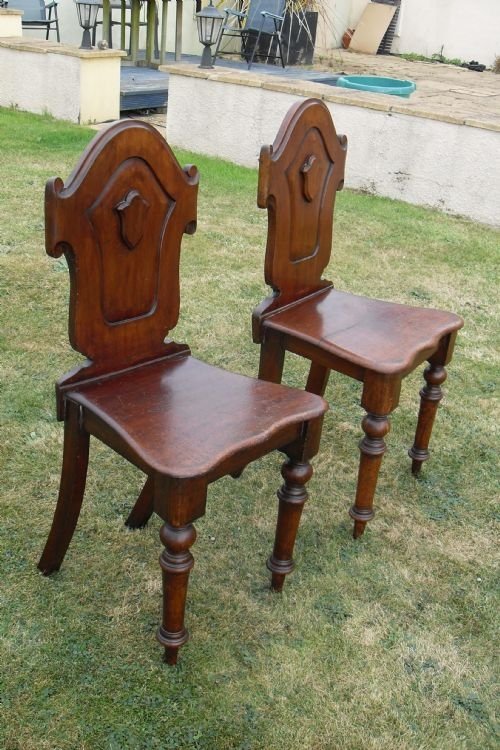 Pair of Victorian Mahogany Carved Shield Backed Hall Chairs