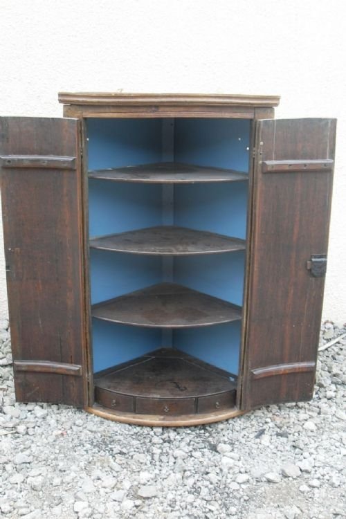 Early 19th Cent Carved Oak Bowfronted Corner Cabinet