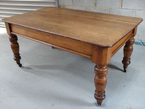 Victorian Oak Country Table with Turned Supports on Castors