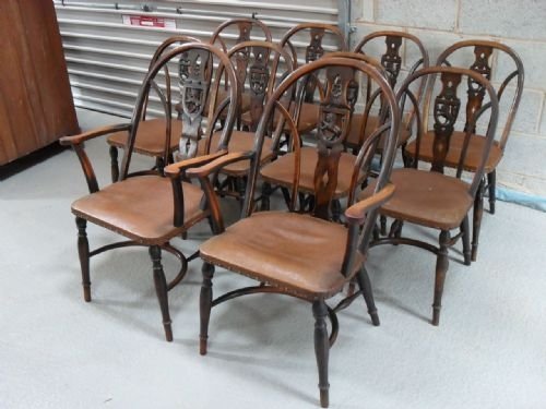 Set of Ten Beechwood Dining Chairs, 2 Carvers with Lion and Rose Carving