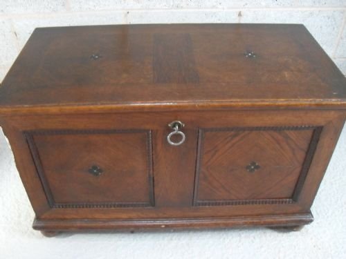 Oak Coffer with Inlay and Carved Mouldings on Bun Feet