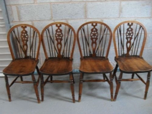 Set of Four Elm and Beech Wheelback Dining Chairs
