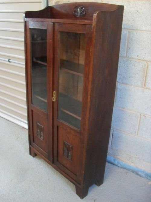 Oak 2 Door Glazed Bookcase with Carved Floral Motifs