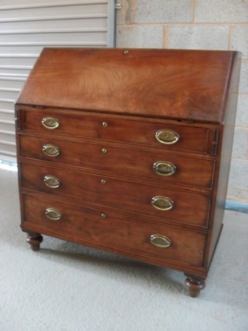 Georgian Flame Mahogany Bureau on Turned Legs