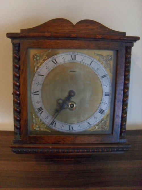 Oak Cased Hanging Wall Clock with Barley Twist Columns