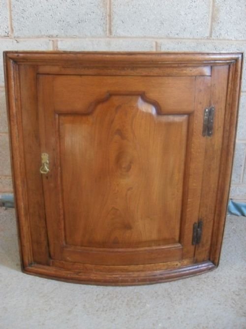 19th Cent Heavy Elm and Oak Bow Hanging Corner Cupboard